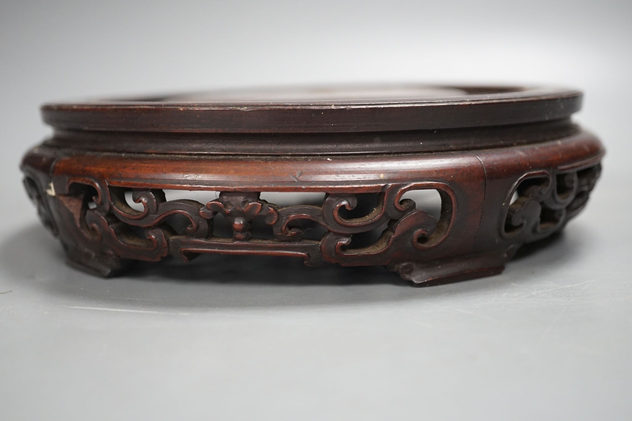 A Chinese carved hardwood stand 19cm